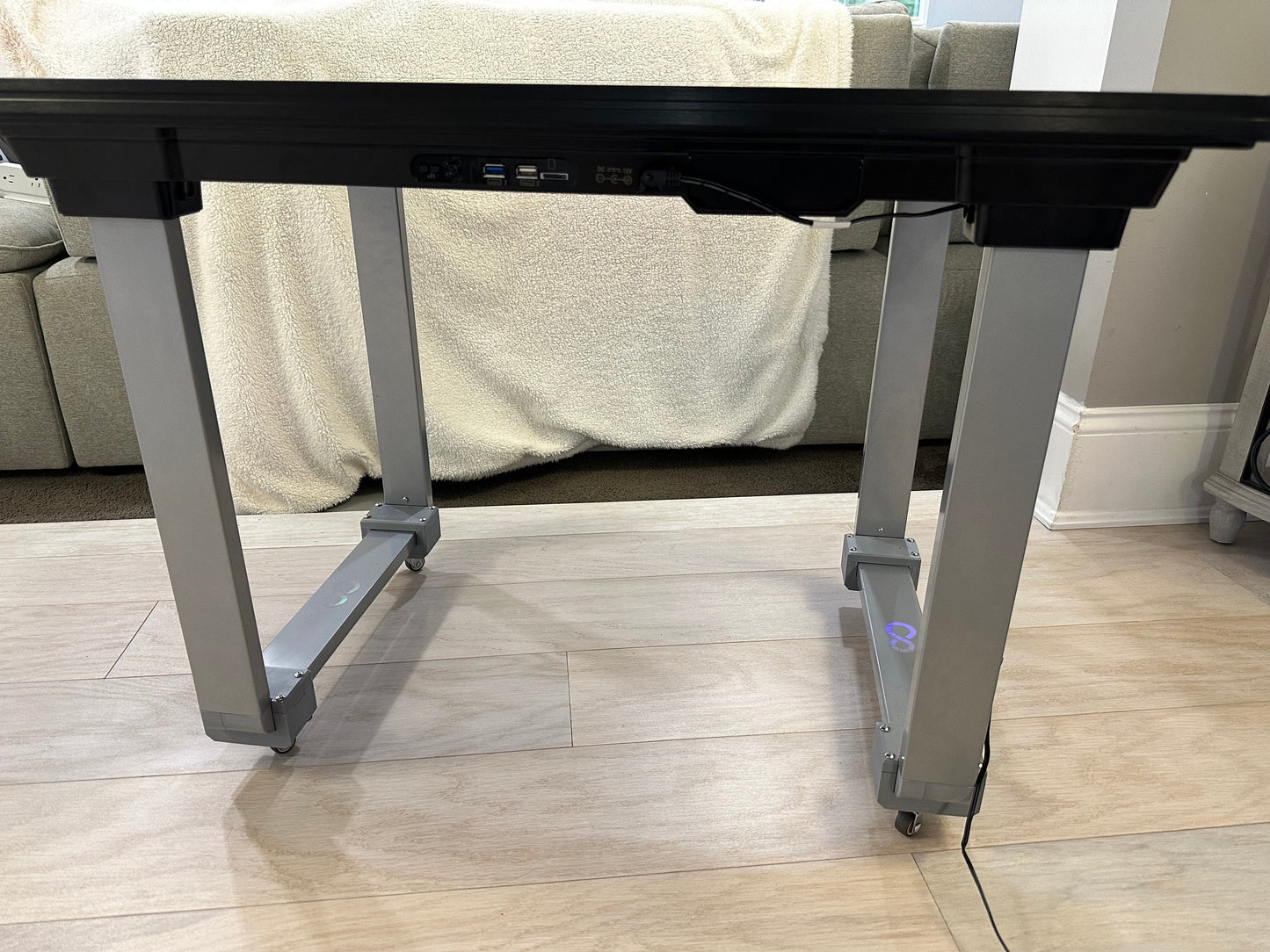 Side view showing table height with low‑profile caster kit