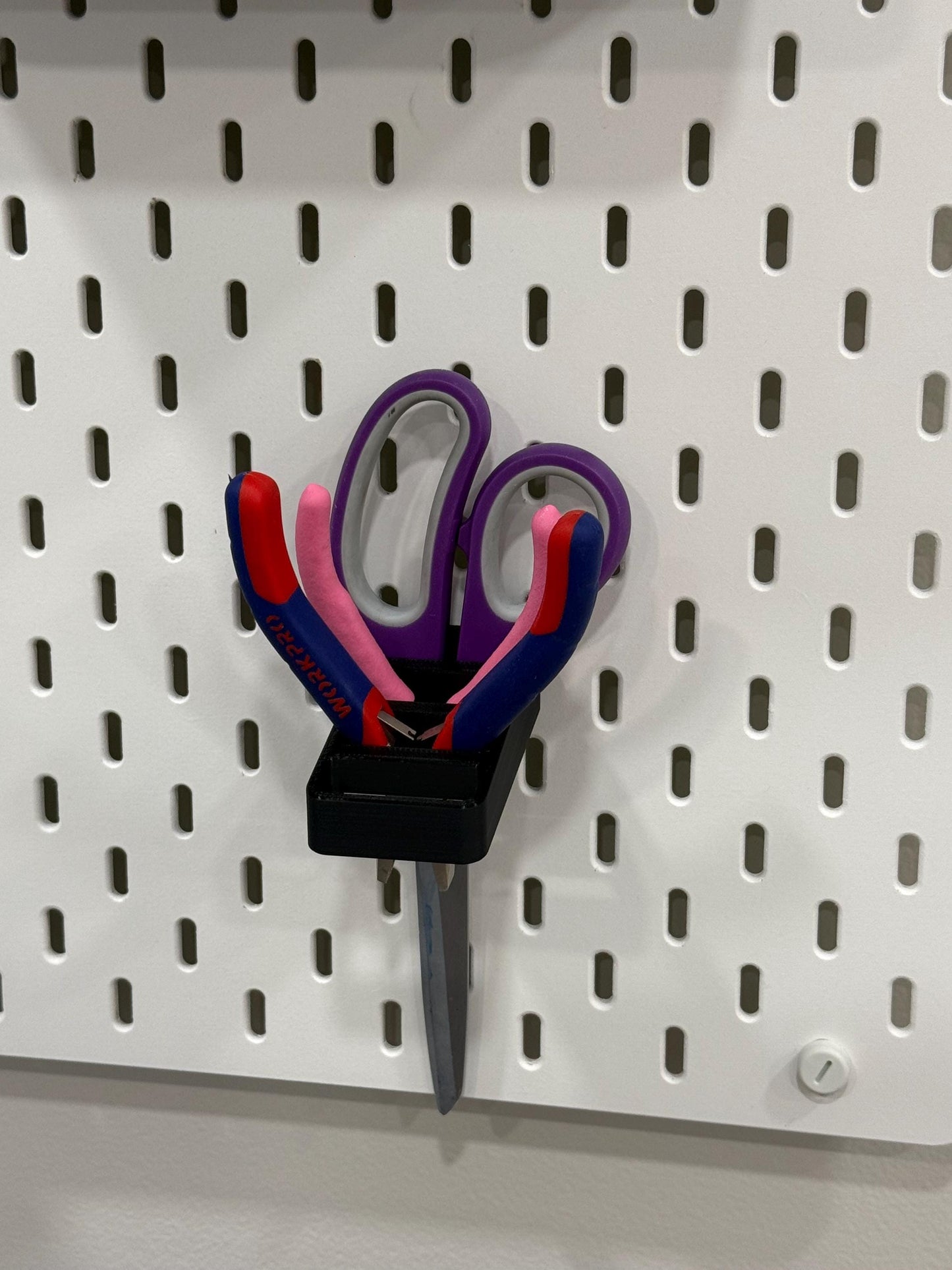 Scissor, plier, and tool holder for IKEA SKADIS pegboards