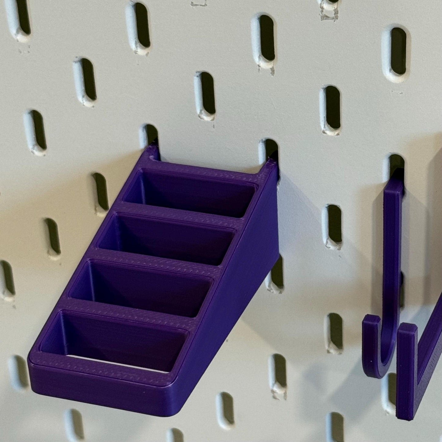 Scissor, plier, and tool holder for IKEA SKADIS pegboards