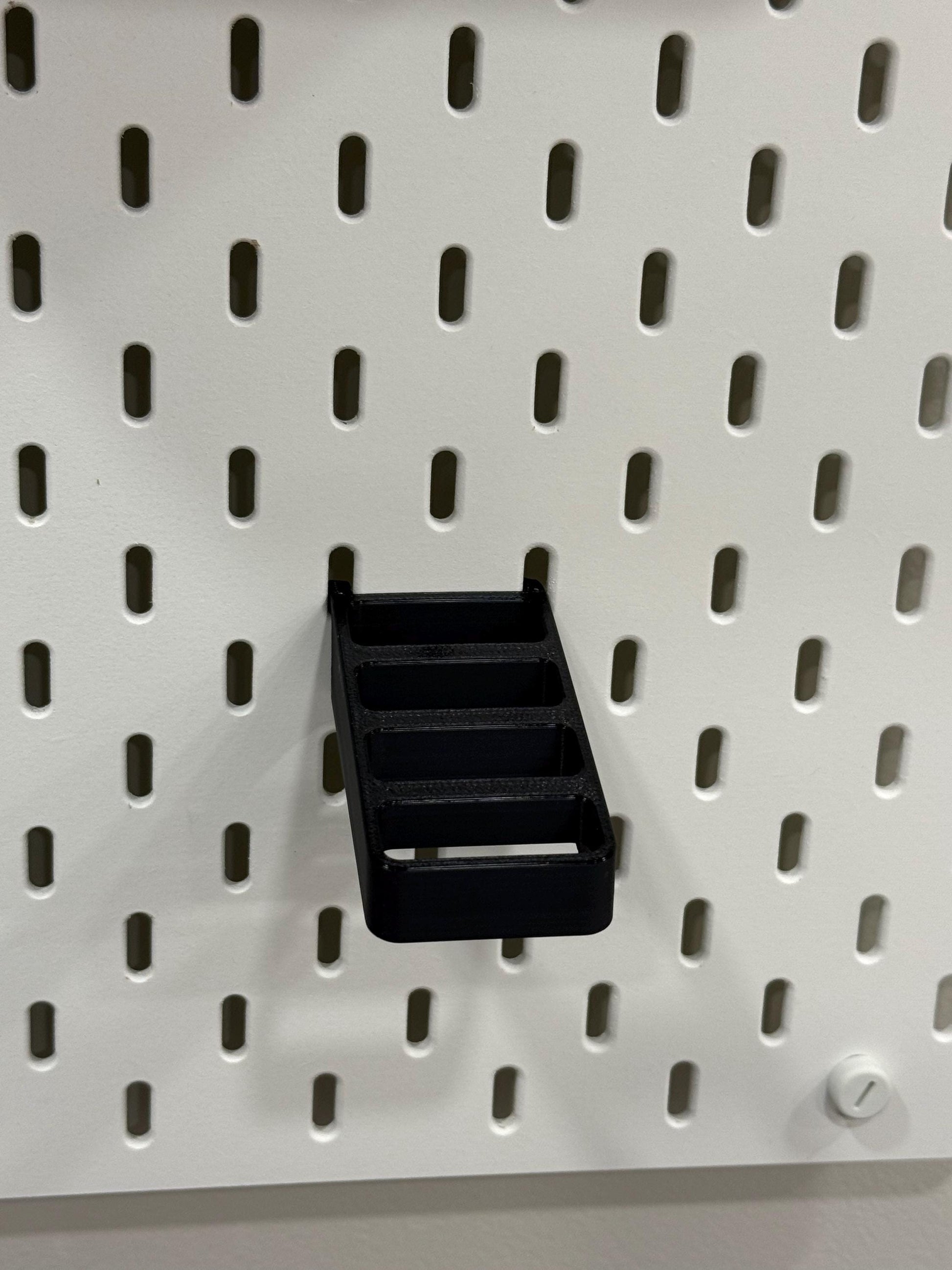 Scissor, plier, and tool holder for IKEA SKADIS pegboards