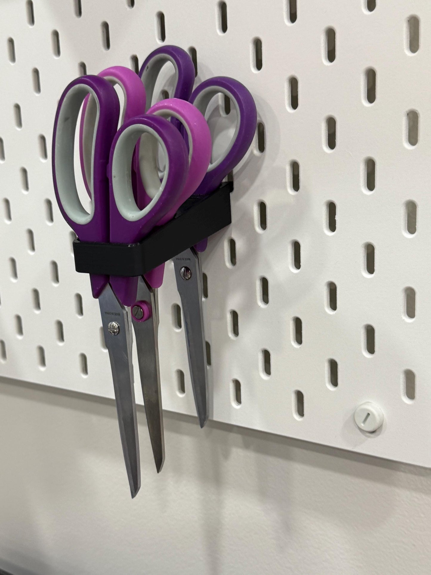 Scissor, plier, and tool holder for IKEA SKADIS pegboards