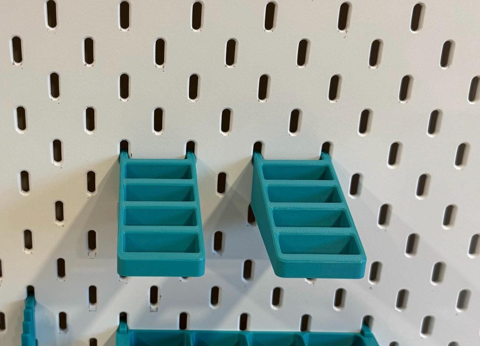 Scissor, plier, and tool holder for IKEA SKADIS pegboards