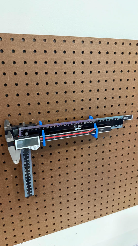 Ruler and Straight Edge tool holder for 1/4 inch pegboard