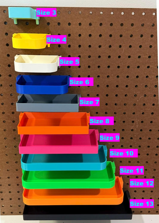 3D-printed pegboard shelves for standard 1/4 inch holes in various sizes